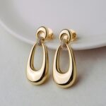 BRINCO BANHO OURO 18K 2 BASES VASADAS LIGADA COM MEIA HASTE CRAV ZIRCONIA  TIPO GOTA