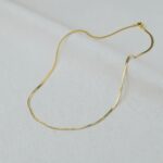 COLAR BANHO OURO 18K FITA FINA TRABALHADA 45 CM